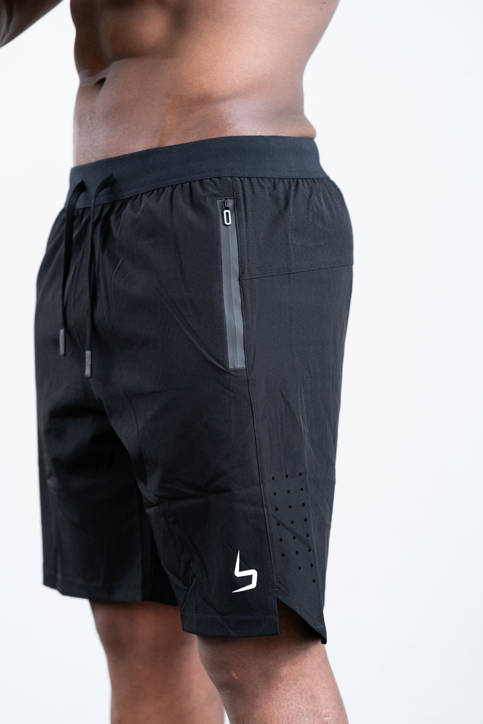 man wearing botthms black training sport short